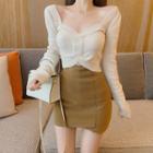 Long-sleeve Cropped Knit Top / Mini Fitted Skirt