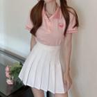 Short-sleeve Peach Polo Shirt / Mini Pleated Skirt