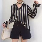 Striped V-neck Shirt / Plain A-line Skirt
