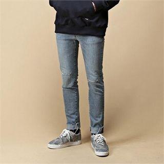 Slit-detail Fray-hem Washed Jeans