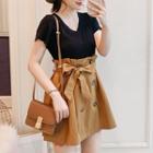 Set: Short-sleeve V-neck T-shirt + Double-breasted A-line Skirt
