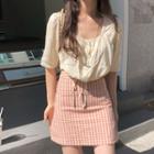 Elbow-sleeve Top / Plaid A-line Skirt