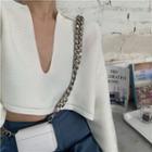 Long-sleeve Cropped Collared Knit Top