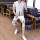 Set: Short-sleeve Patterned T-shirt + Cropped Pants