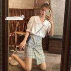 Frilled Short-sleeve Blouse / Plaid Slim-fit Skirt