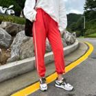 Drawstring-waist Piped Jogger Pants