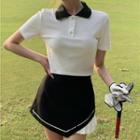 Short-sleeve Contrast Collar Cropped Polo Shirt / Asymmetrical Mini A-line Skirt