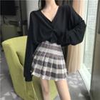 Long-sleeve Plain Twisted Top / High-waist Plaid Pleated Skirt