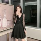 Lace-sleeve Paneled Double-breasted A-line Dress