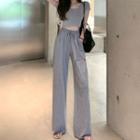 Cap-sleeve T-shirt / Cutout Pants