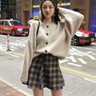Buttoned Cardigan/ Plaid Mini A-line Skirt/ Set