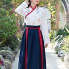 Set: Long-sleeve Top + Embroidered A-line Midi Skirt