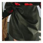 Wrap-front Faux-leather Miniskirt