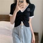Short-sleeve Letter Embroidered Drawstring Knit Top