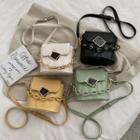 Irregular Buckled Quilted Bucket Bag