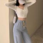 Long-sleeve Buttoned Knit Top / Wide-leg Sweatpants