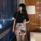 Letter-embroidered Short-sleeve T-shirt / Printed A-line Skirt