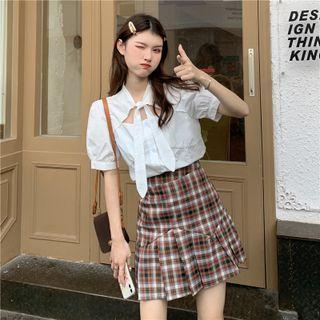 Short-sleeve Tie-neck Cut-out Blouse / Plaid Mini Pleated Skirt