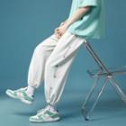 Lettering Print Drawstring-cuff Crop Sweatpants