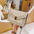 Studded Croc Grain Chain Crossbody Bag