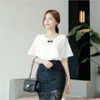 V-neck Short-sleeve Blouse With Brooch