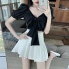 Puff-sleeve Bow Cropped Blouse / Pleated A-line Skirt