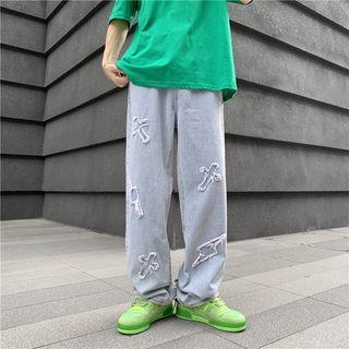 Mid Rise Crisscross Embroidered Wide Leg Jeans