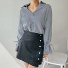 Buttoned Faux-leather Wrap Miniskirt