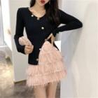 Long-sleeve Cut Out Knit Top / Feather-accent Mini A-line Skirt