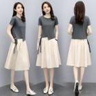Set: Short-sleeve Irregular T-shirt + A-line Midi Skirt