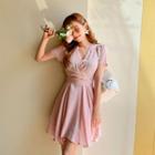 Wrap-front Handkerchief-hem Dress