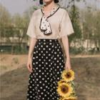 Set: Short-sleeve Tie-neck T-shirt + Dotted Midi A-line Skirt