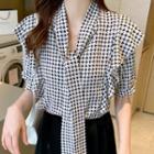 Short-sleeve Tie-neck Houndstooth Blouse