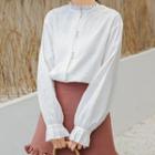 Long-sleeve Buttoned Mock-neck Blouse
