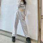 Lettering Cropped Hooded Sweatshirt / Drawstring Gathered Cuff Pants