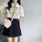 Short-sleeve Lettering Polo Shirt / Mini Pleated Skirt / Set