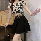 Short-sleeve Cow Print Cropped Blouse / Geommet Mini A-line Skirt