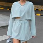 Set: Long-sleeve Asymmetrical Cropped T-shirt + Skort