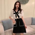 Tie-neckline Colorblock Top / Pearl A-line Skirt