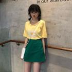 Floral Embroidered Elbow-sleeve T-shirt / Plain A-line Skirt
