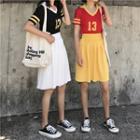 Set : Number Short-sleeve Knit Top + Pleated Mini Skirt