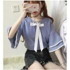 Bell-sleeve Patterned Tie-neck Blouse
