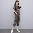 Set: Short-sleeve Print Asymmetrical Top + Straight Leg Cropped Pants
