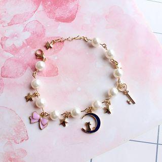 Multi-charm Faux Pearl Bracelet