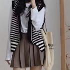 Long-sleeve Plain T-shirt / Striped Button-up Sweater Vest / Mini Pleated Skirt / Set