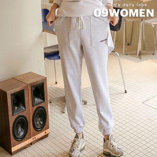 Letter-embroidered Jogger Pants