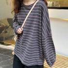 Long-sleeve Striped T-shirt / A-line Midi Skirt