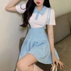 Set: Short-sleeve Polo Shirt + Mini A-line Suspender Skirt