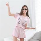 Set: Cat-printing T-shirt + Frill-hem Shorts
