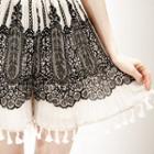 Set: V-neck Pointelle Knit Top + Tassel-detail Skirt